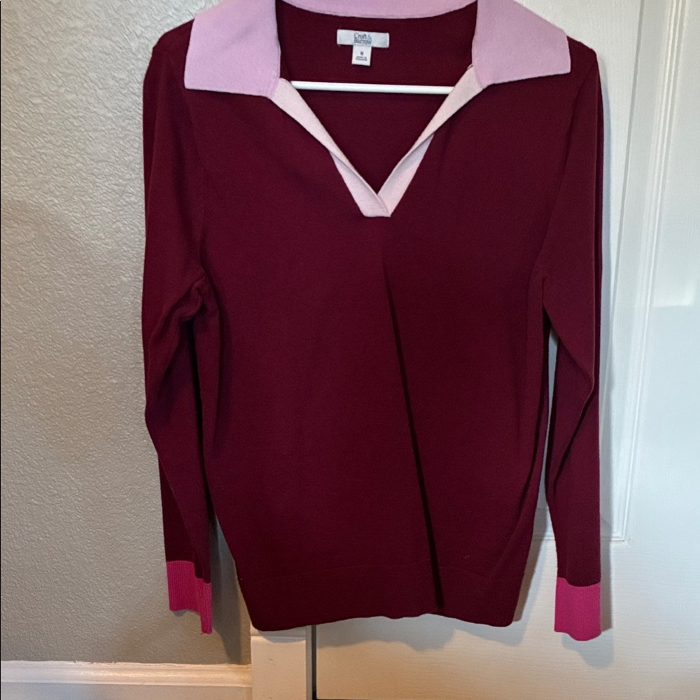 V neck sweater.